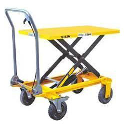 Scissor-lift-table-mounted-on-pneumatic-castors-available-from-R-J-Cox-Engineering